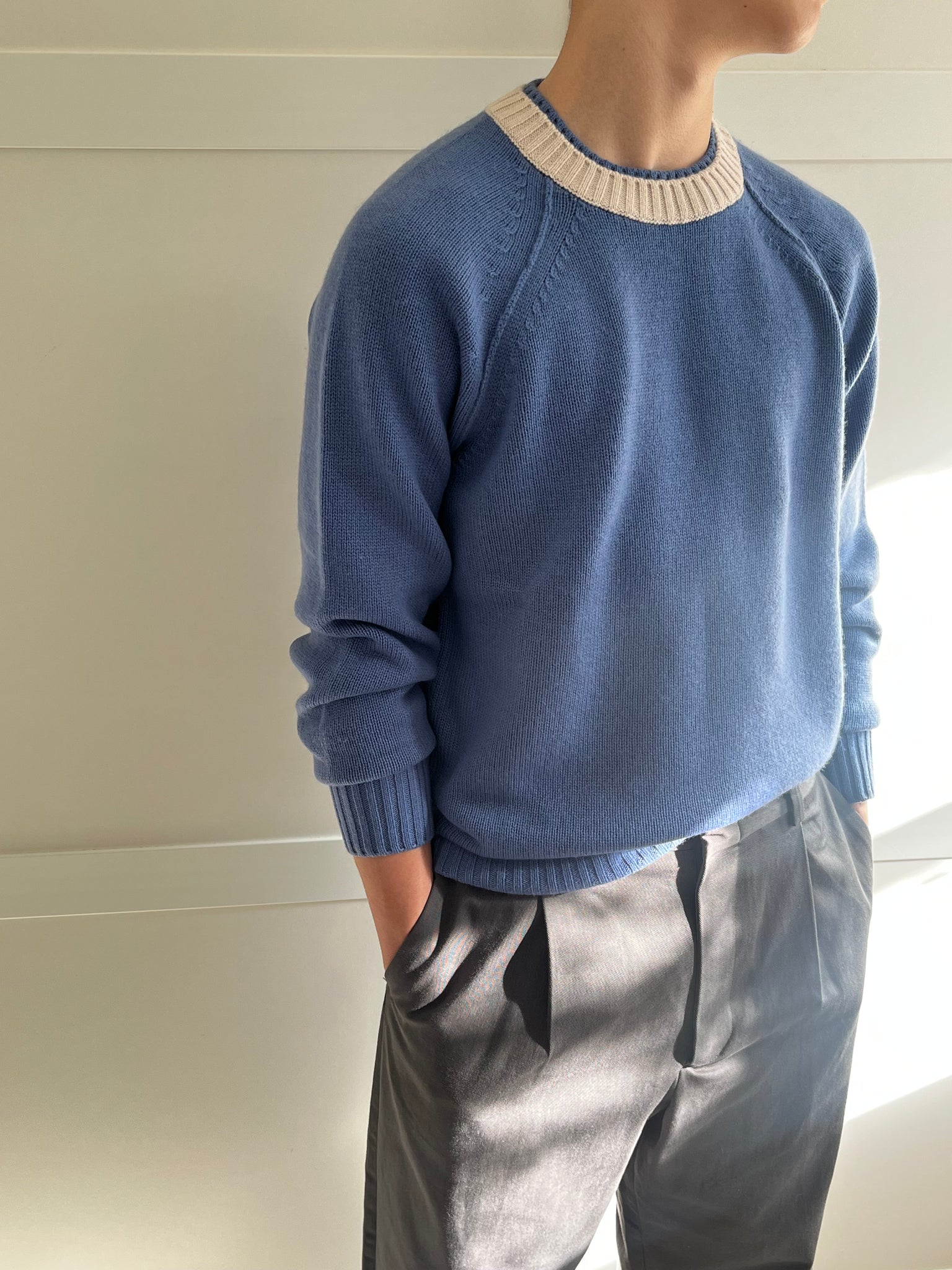 Light blue cashmere sweater with contrast colour neck
