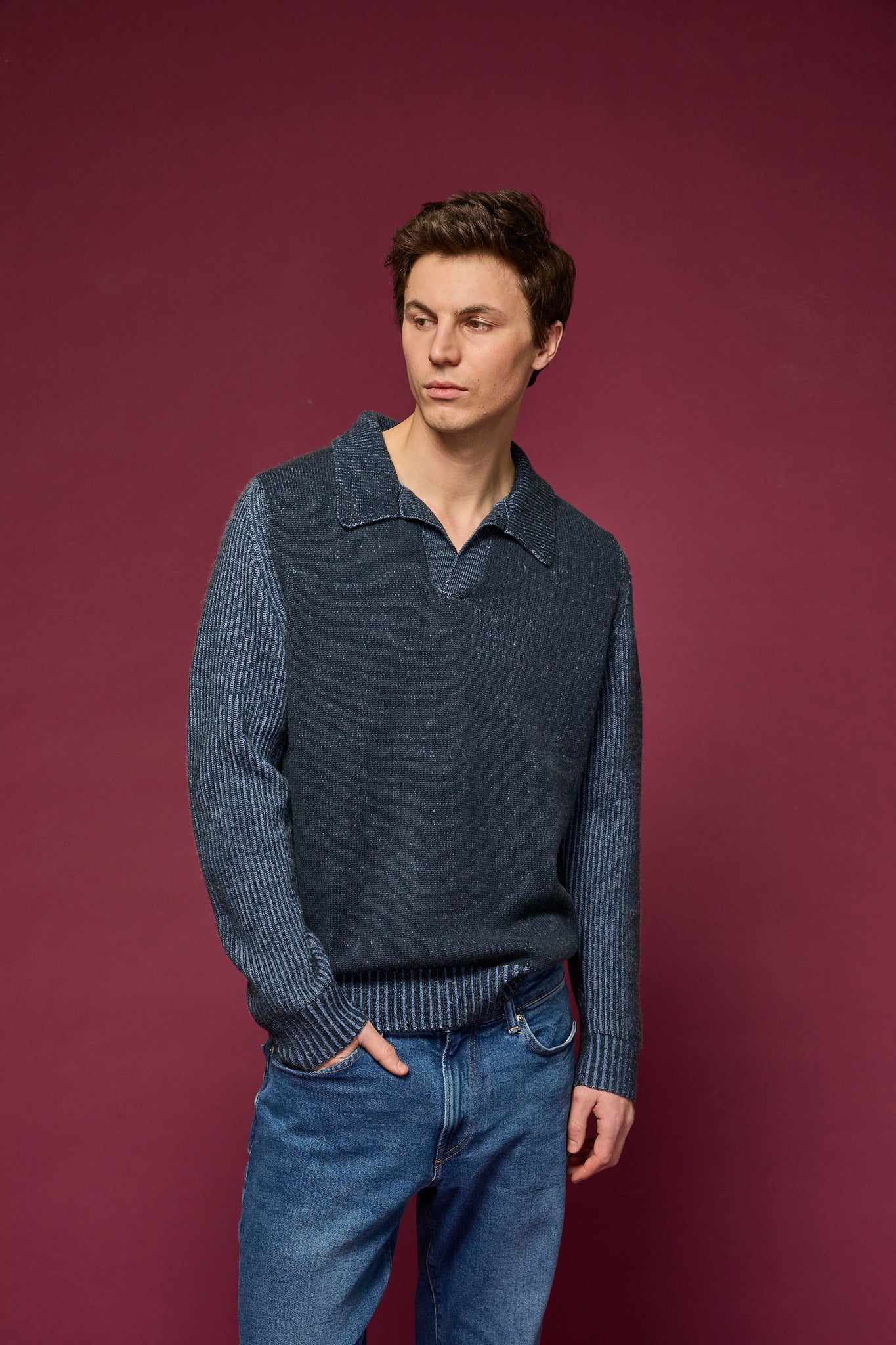 Man wearing a wool and cashmere polo collared jumper.